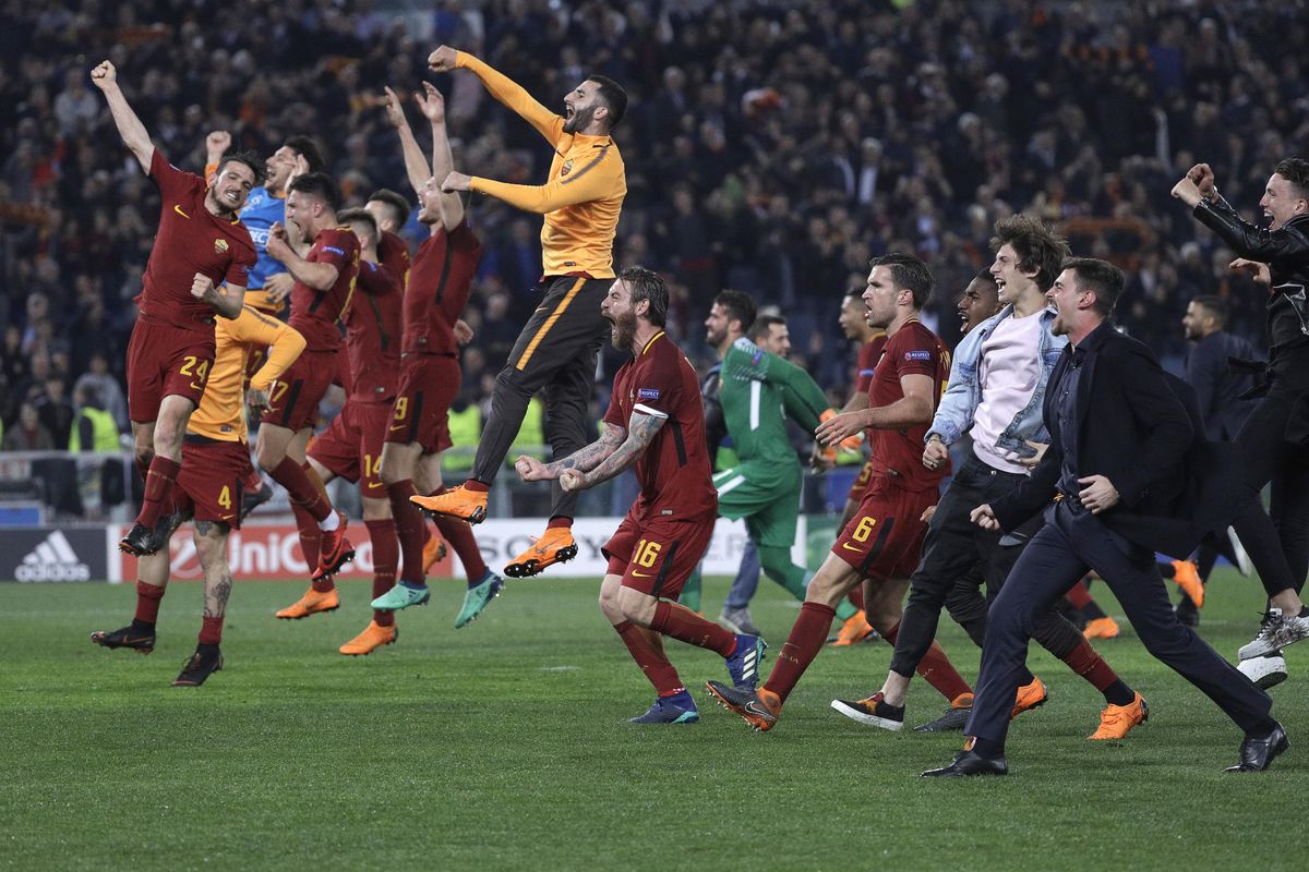 Roma players celebrate reaching the semifinals after the Champions League quarterfinal second leg soccer match between between Roma and FC Barcelona, at Rome’s Olympic Stadium, Tuesday, April 10, 2018. (Gregorio Borgia / Associated Press)