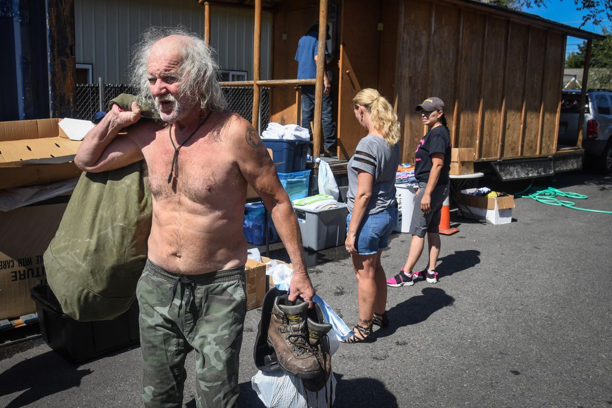 Mike Quesnell, 66, is all refreshed after cleaning up in the Shower of Hope mobile shower, Tuesday, Aug. 28, 2019, in the Spokane Valley Partners parking lot. The group Jewels Helping Hands started the mobile shower unit to reduce body lice in the homeless community. (Dan Pelle / The Spokesman-Review)