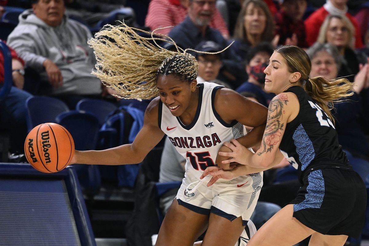 Gonzaga forward Yvonne Ejim (15) steals the ball from Western Washington guard Mason Oberg (23) during the first half of a NCAA college basketball game, Friday, Nov. 4, 2022, in the McCarthey Athletic Center.  (COLIN MULVANY/THE SPOKESMAN-REVIEW)