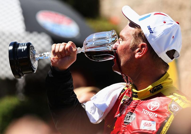 Clint Bowyer sips from the winner's glass of wine after prevailing in the Toyota/Save Mart 350 at Sonoma on Sunday, June 24, 2012. (Photo Credit: By Ezra Shaw, Getty Images) (Ezra Shaw / Getty Images North America)