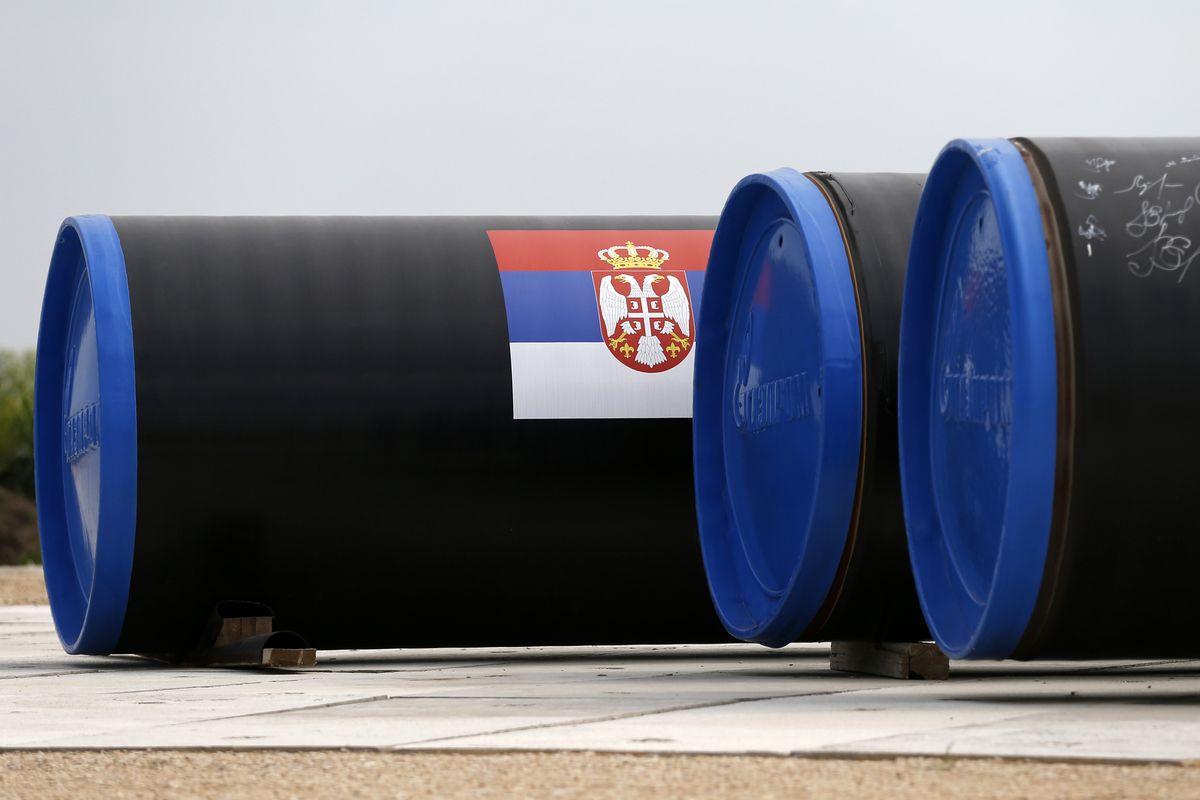 FILE - In this Friday, June 13, 2014, file photo, a Serbian flag is seen on a gas pipe on the first section of the Gazprom South Stream natural gas pipeline near the village of Sajkas, 80 kilometers (50 miles) north of Belgrade, Serbia. Defying U.S. calls to reduce its dependency on energy supplies from Russia, Serbia has on Friday, Jan. 1, 2021 officially launched a new gas link that will bring additional Russian gas to the Balkan country via Bulgaria and Turkey.  (Darko Vojinovic)