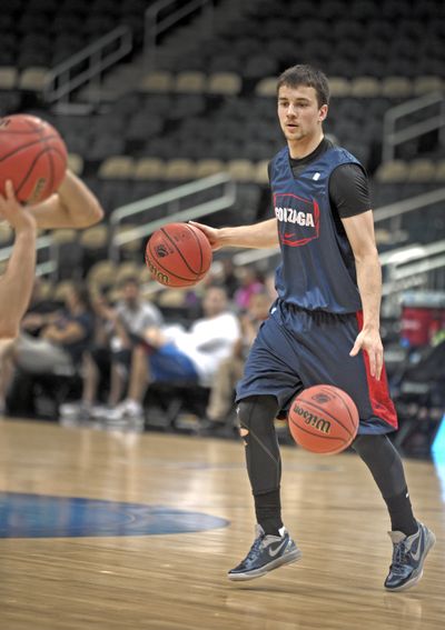 GU guard Kevin Pangos dribbles two balls at Wednesday’s practice. (Christopher Anderson)