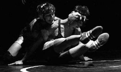
EV's Jake Rodriguez tries unsuccessfully to wrestle CV's Nick Cambron to the mat. Cambron won. 
 (Amanda Smith / The Spokesman-Review)