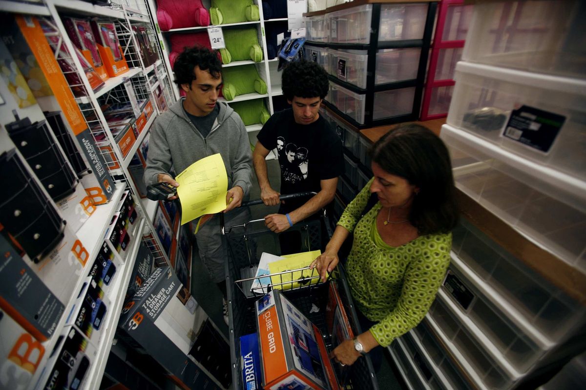 Sharon Lerman shops with her son Ben Lerman, center, and his friend Daniel Gordon at Bed Bath & Beyond in Los Angeles. 