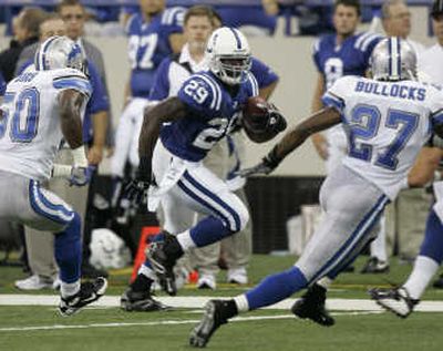 
Colts running back Joseph Addai picks up a first down. Associated Press
 (Associated Press / The Spokesman-Review)