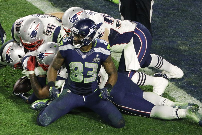 Seattle Seahawks wide receiver Ricardo Lockette (83) reacts after New England Patriots strong safety Malcolm Butler (21) intercepted the ball during the second half of NFL Super Bowl XLIX football game Sunday, Feb. 1, 2015, in Glendale, Ariz.  (AP Photo/Charlie Riedel)