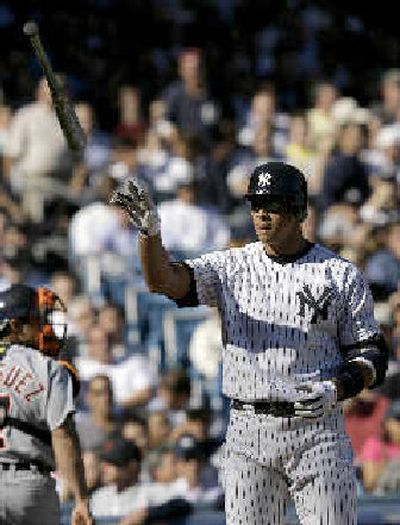 Alex Rodriguez tosses his bat after striking out, the fourth time in eight series at-bats.
(Associated Press / The Spokesman-Review)