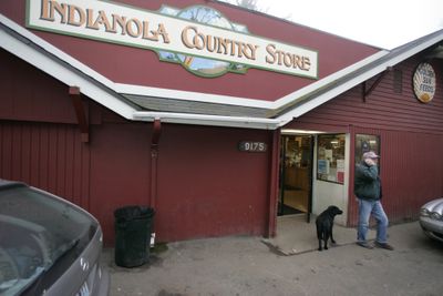 Duane Niemi talks on his cell phone outside the Indianola Country Store in Indianola, Wash., on Friday near the epicenter of a magnitude 4.5 earthquake.  There were no immediate reports of damage.  (Associated Press / The Spokesman-Review)