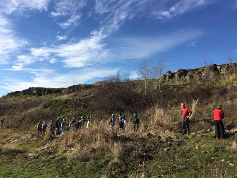 Volunteers from the Washington Trails Association put their muscle into a multi-year effort to build a loop trail at Fishtrap Lake. (Kristy Canright)
