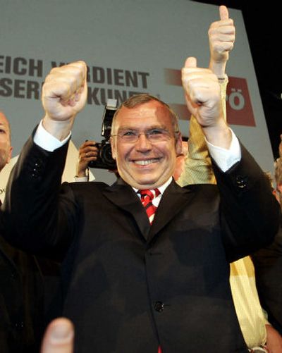 Top candidate of the Austrian Social Democrats Alfred Gusenbauer celebrates when arriving Sunday at party headquarters in Vienna. 
 (Associated Press / The Spokesman-Review)