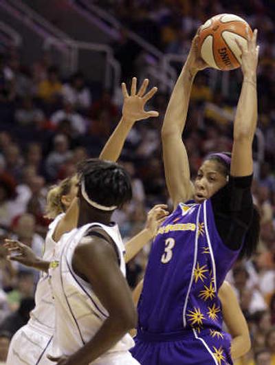 
Candace Parker, right, and her L.A. Sparks play the Washington Mystics today on ABC. Associated Press
 (Associated Press / The Spokesman-Review)