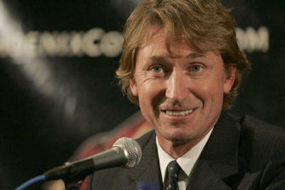 
Wayne Gretzky chats with the media Monday after being introduced as the new coach of the Phoenix Coyotes.  
 (Associated Press / The Spokesman-Review)