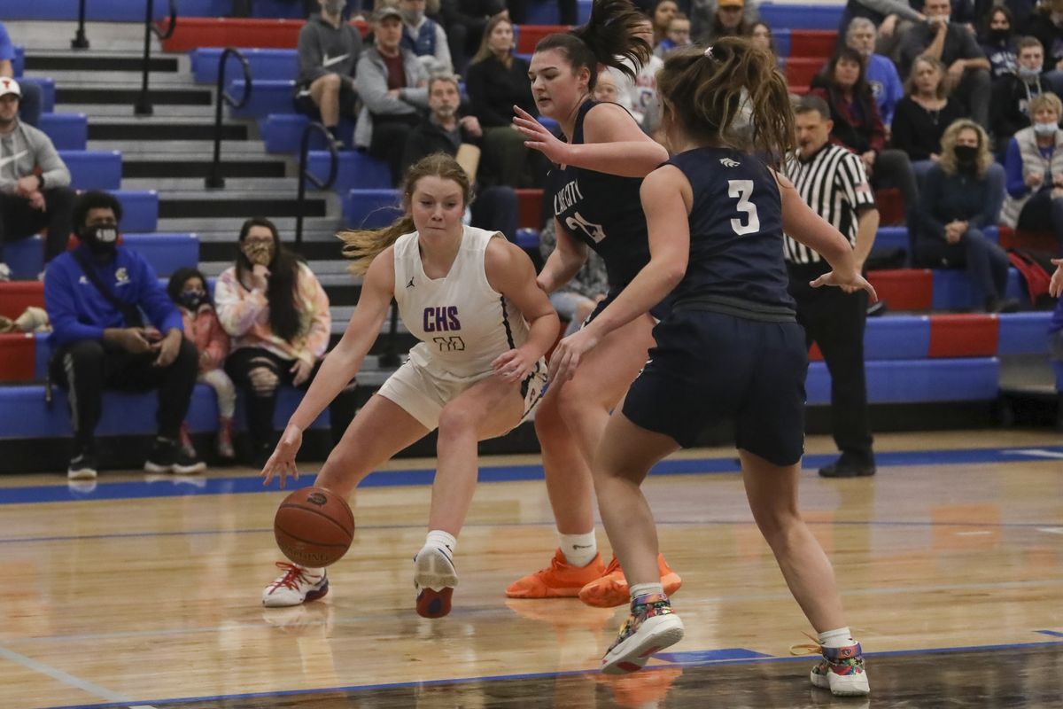 Madi Symons of Coeur d’Alene drives against Lake City in the first half of the Idaho 5A District 1-2 championship game on Tuesday.  (CHERYL NICHOLS/For The Spokesman-Review)