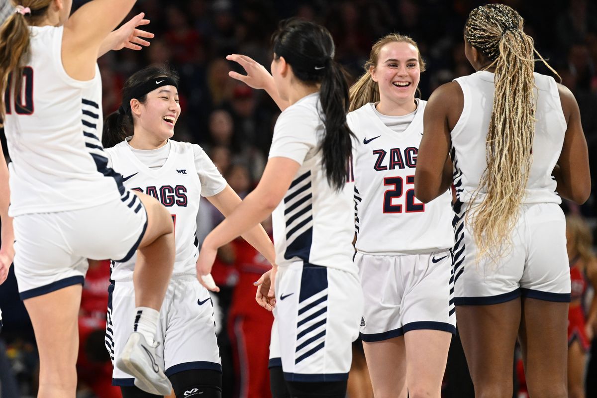 Gonzaga players celebrate with each other during the second half of last Saturday’s game at McCarthey Athletic Center. (Tyler Tjomsland/The Spokesman-Review)
