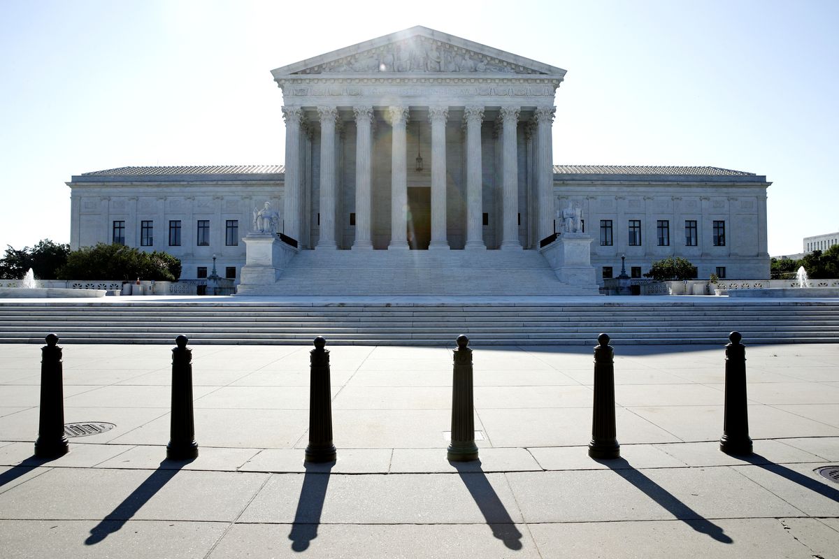 The sun rises behind the Supreme Court on Capitol Hill in Washington, Monday, June 29, 2020. The Supreme Court has struck down a Louisiana law regulating abortion clinics, reasserting a commitment to abortion rights over fierce opposition from dissenting conservative justices in the first big abortion case of the Trump era.  (Patrick Semansky)