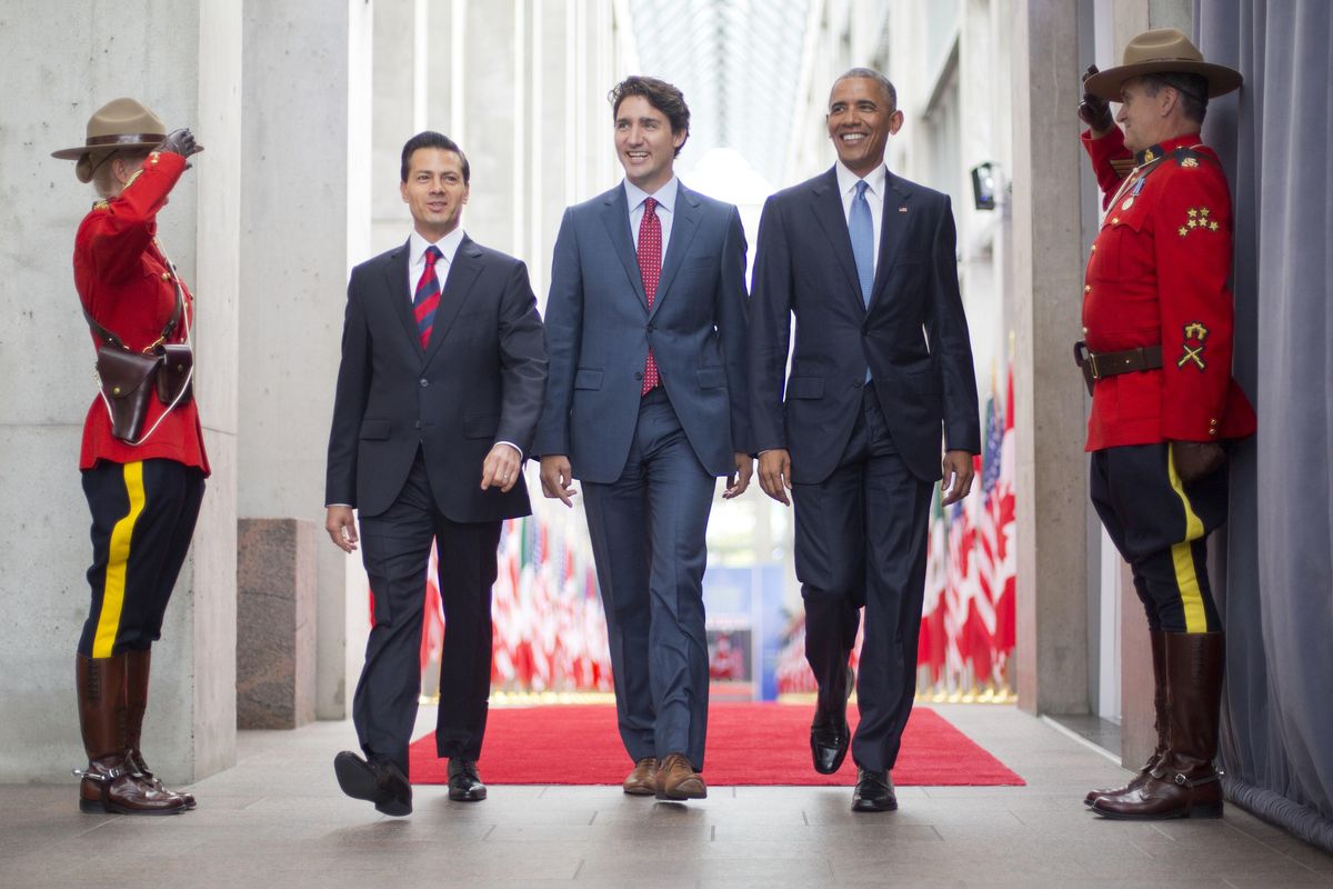 President Barack Obama walks with Canadian Prime Minister Justin Trudeau and Mexican President Enrique Pena Neito at the National Gallery of Canada in Ottawa, Canada, Wednesday, June 29, 2016. Obama traveled to Ottawa for the North America Leaders’ Summit. (Pablo Martinez Monsivais / Associated Press)