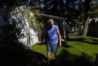 
Bayview resident Skip Wilcox walks near his trailer in Bayview.   Wilcox, who has found another place to live, led park tenants in a prior effort to purchase the park to avoid displacement. The Spoksman-Review
 (File The Spoksman-Review / The Spokesman-Review)