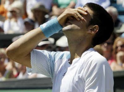 
Serbia's Novak Djokovic feels the pain in losing a second-round match against Russia's Marat Safin.Associated Press
 (Associated Press / The Spokesman-Review)