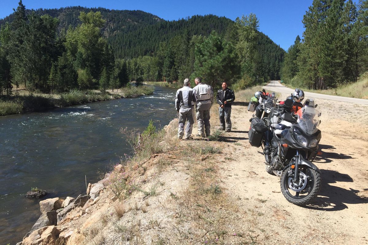Motorized Rolling Thunder members pause by the Bitterroot River just south of Darby, Montana. (Jon Stanley)