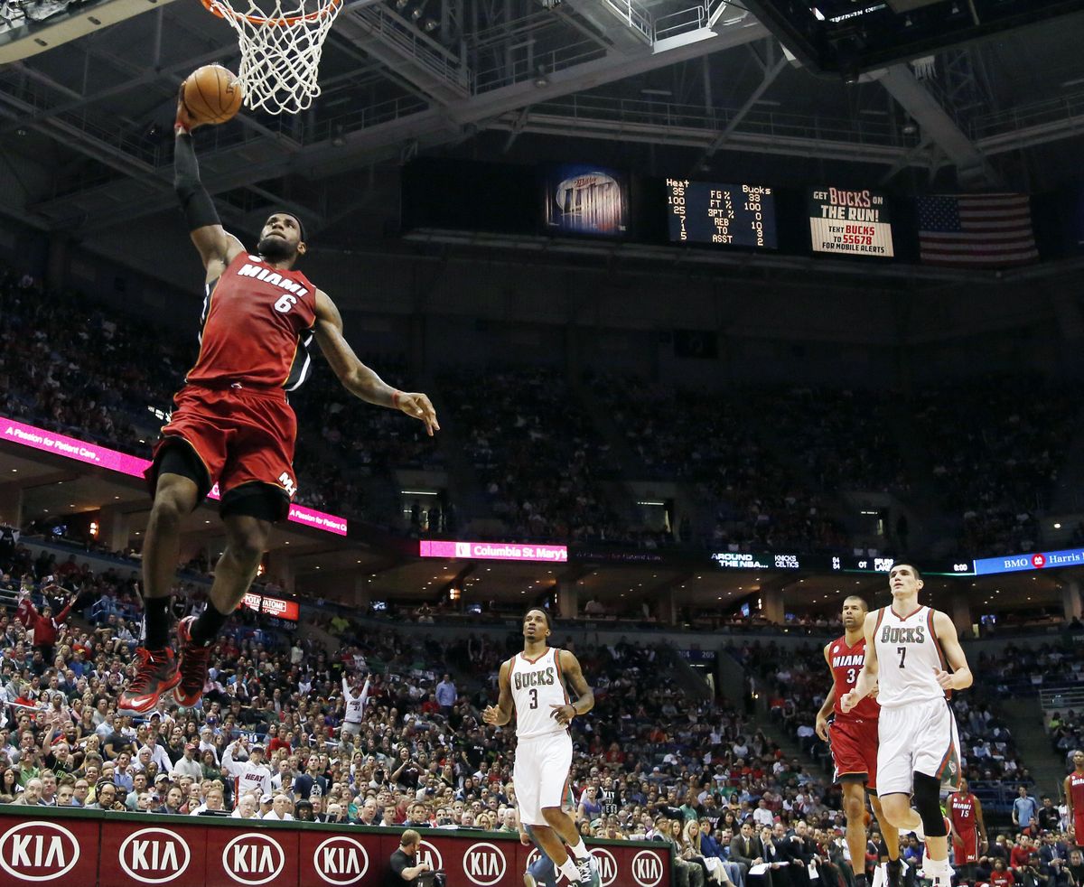 LeBron James dunks during the Heat’s series-clinching win over the Bucks. (Associated Press)