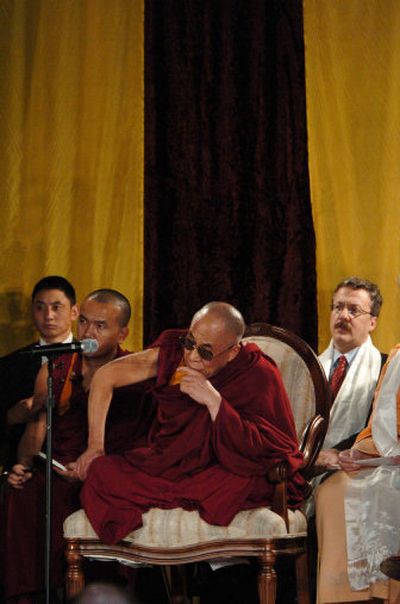 
 The Dalai Lama leads a  discussion about how to mitigate religious intolerance during a summit in San Francisco on Saturday. 
 (Associated Press / The Spokesman-Review)