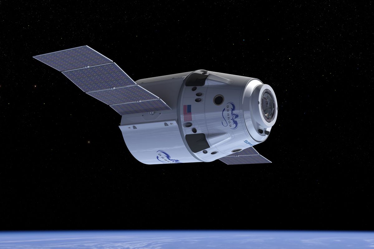 This undated illustration provided by SpaceX shows a Dragon Crew spacecraft in Earth orbit showing solar panels in the process of deploying. (Associated Press)