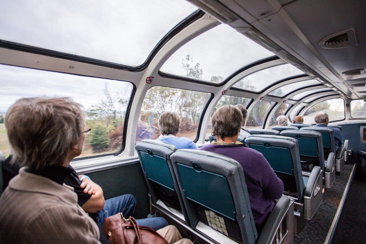 Taking in the view from a Skyline Dome car. (Via Rail / TNS)