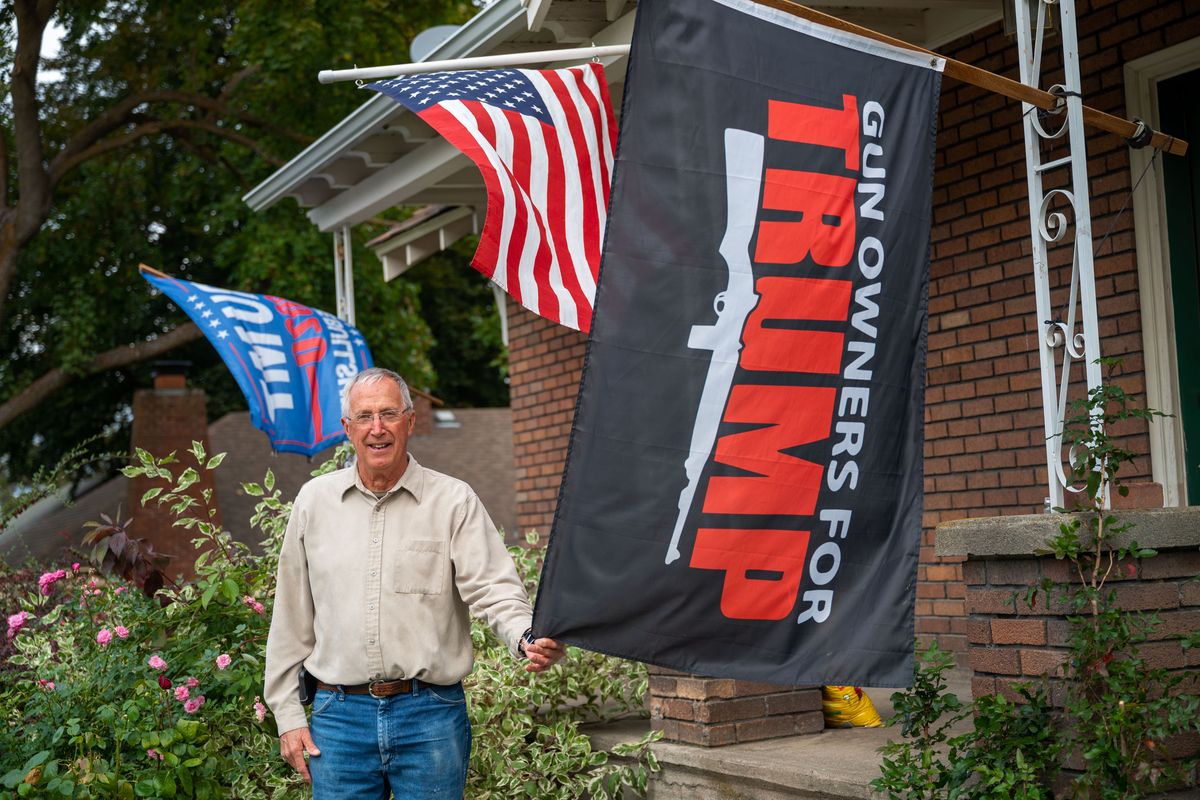 Gary Neal proudly flies his Trump flags in front of his house at 17th Avenue and Perry Street on Monday.  (Colin Mulvany/THE SPOKESMAN-REVIEW)