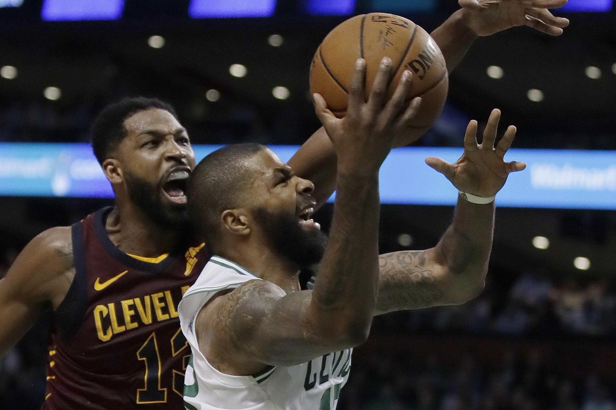 Boston Celtics forward Marcus Morris drives to the basket against Cleveland Cavaliers center Tristan Thompson, left, during the second half in Game 2 of the NBA basketball Eastern Conference finals Tuesday, May 15, 2018, in Boston. (Charles Krupa / AP)