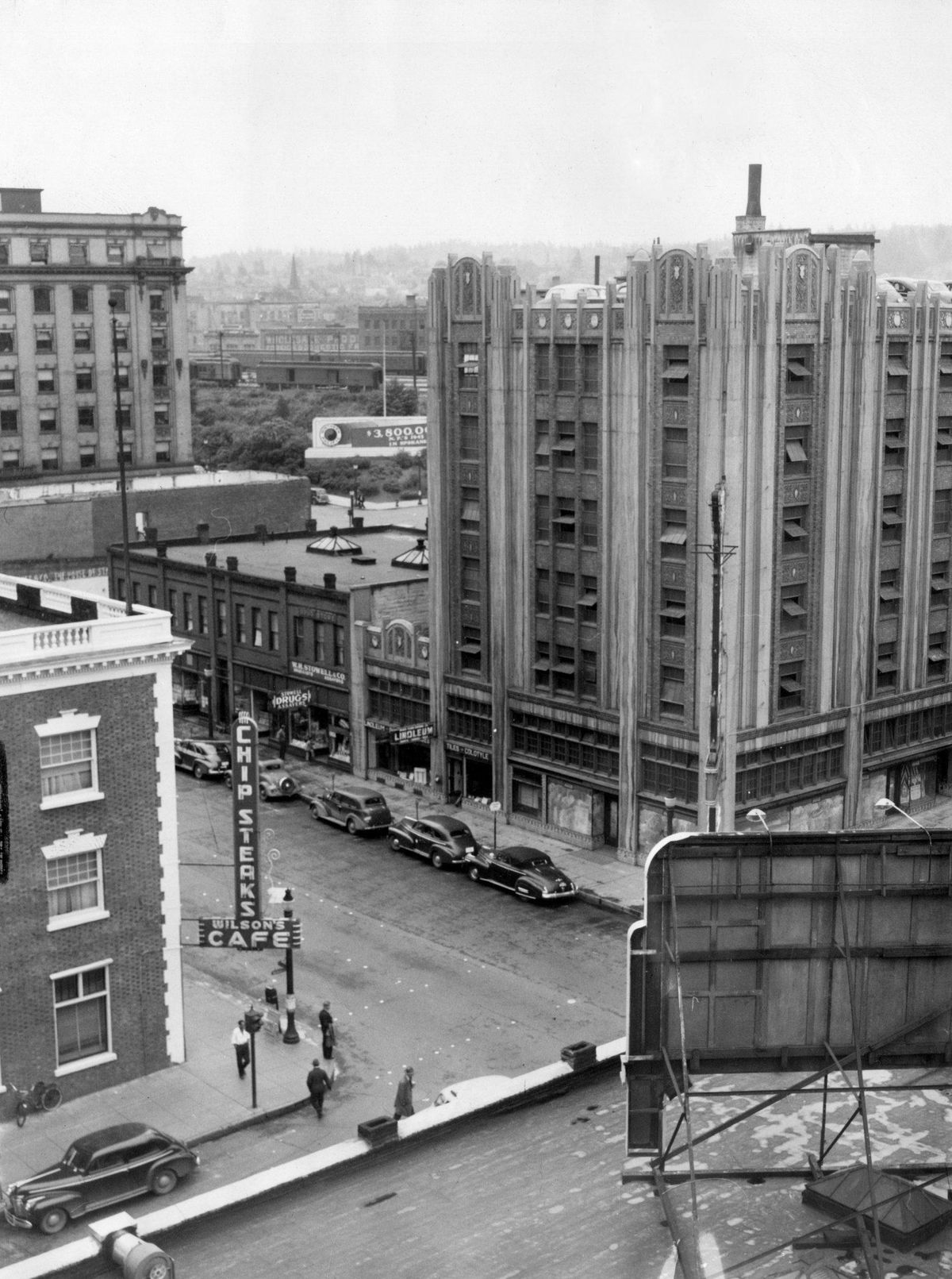 The Art Deco City Ramp garage dominates this 1946 image, but to its left is the two-story Stowell Drug and Assay building. (SR)