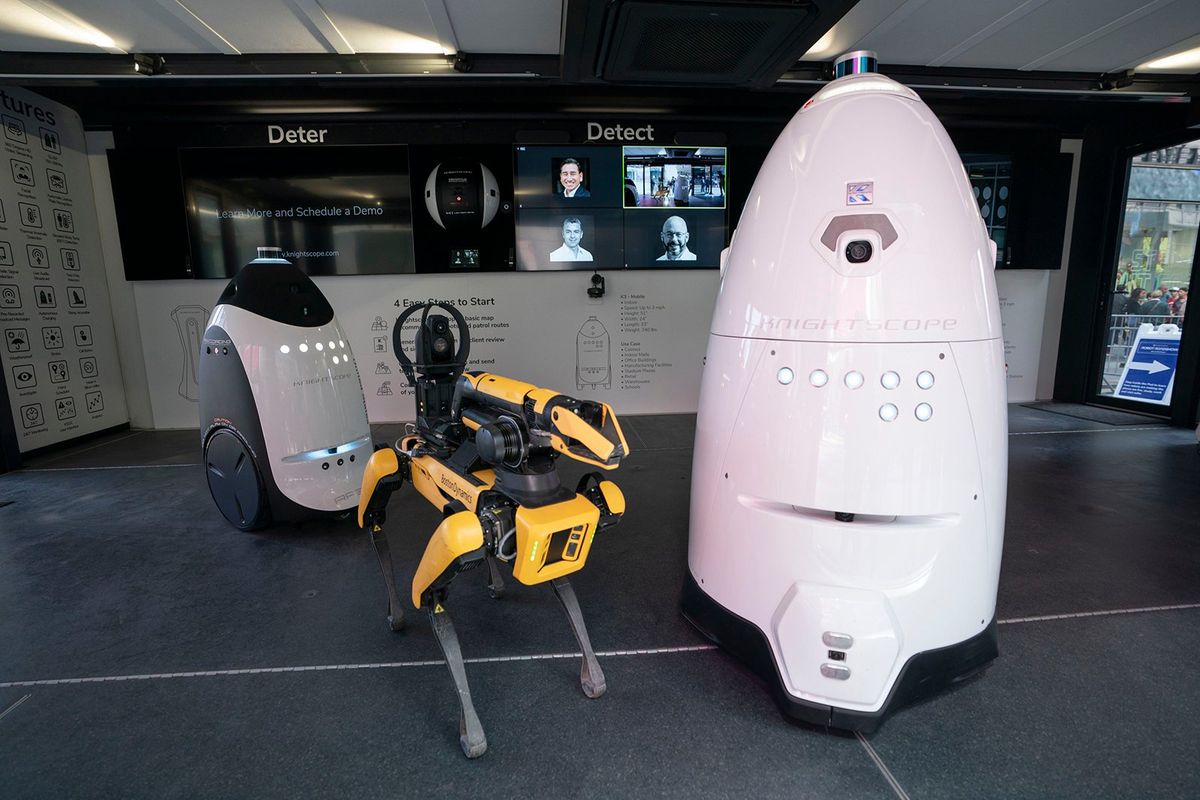 New NYPD policing technology, including "Digi Dog" (center) and a K5 Autonomous Security Robot (ASR), are pictured during a press conference in Times Square on Tuesday, April, 11 in Manhattan, New York.  (Tribune News Service)