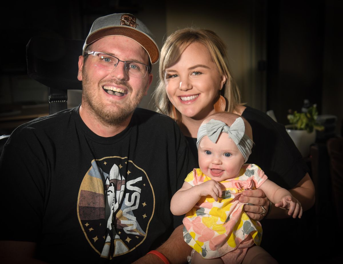 Dan and Ashley Marlow decided to have their daughter, Remi, age 6 months, despite Dan’s battle with ALS. (Dan Pelle / The Spokesman-Review)