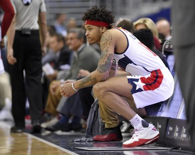 In this March 3, 2017, file photo, Washington Wizards forward Kelly Oubre Jr. waits to enter the game during the first half of an NBA basketball game against the Toronto Raptors in Washington. Oubre Jr. was suspended for Game 4 against the Boston Celtics after charging and knocking over Kelly Olynyk in Game 3, the NBA announced Saturday, May 6, 2017. Game 4 is Sunday evening in Washington. (Nick Wass / Associated Press)