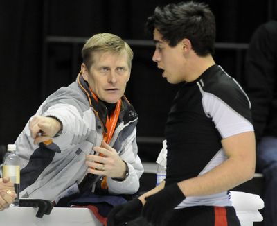 Skating coach Scott Wendlend works with Andrew Gonzalez during the 2010 AT&T U.S. Figure Skating Men's Championship practice, Wednesday Jan. 13, 2010 at the Spokane Veterans Arena. (Dan Pelle / The Spokesman-Review)