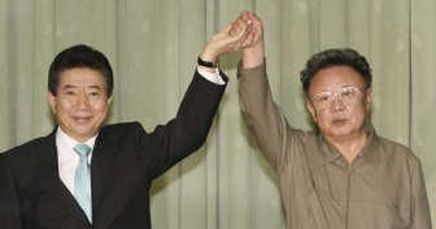 
South Korean President Roh Moo-hyun, left, and North Korean leader Kim Jong Il  signed a wide-ranging agreement today. Associated Press
 (Associated Press / The Spokesman-Review)