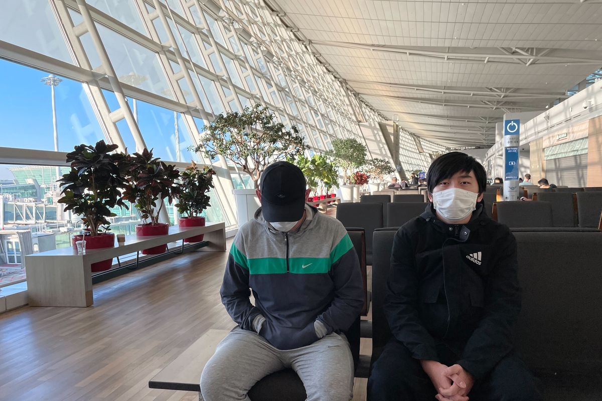 Vladimir Maraktaev, 23, right, and a 30-year-old man who spoke on the condition of anonymity are among the five Russians who arrived at South Korea’s Incheon Airport seeking refugee status after receiving a draft notice but remain in limbo.  (Michelle Ye Hee Lee/The Washington Post)