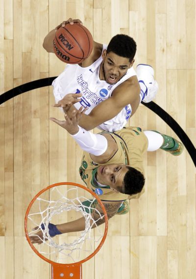 Kentucky's Karl-Anthony Towns was one-man wrecking crew against Notre Dame. (Associated Press)