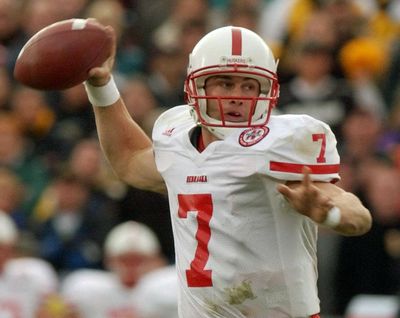 In this Nov. 23, 2001 photo, Nebraska quarterback Eric Crouch rolls out to pass during the third quarter against Colorado in a Big-12 NCAA college football game in Boulder, Colo. A glance at the list of candidates eligible for selection to the College Football Hall of Fame is likely to produce the following reaction: How is that guy not in yet? Heisman Trophy winners Rashaan Salaam, Carson Palmer and Crouch are still waiting. (David Zalubowski / Associated Press)