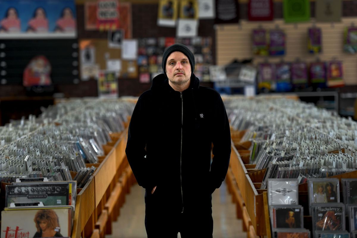 Blackhouse Records founder Scott Rozell is photographed at the Long Ear CDs & Stuff in Coeur d’Alene on Tuesday afternoon. Rozell co-founded the music label in 2001.  (Kathy Plonka/The Spokesman-Review)