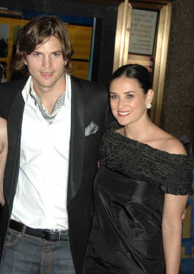 
Ashton Kutcher, with wife Demi Moore, is among the stars who have been spotted sporting ascot-like neckwear.McClatchy-Tribune photo
 (McClatchy-Tribune photo / The Spokesman-Review)