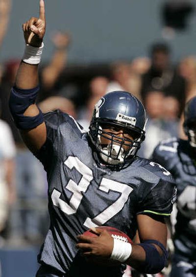 
Seattle's Shaun Alexander said he likely injured his cracked wrist in the Seahawks' game against Tampa Bay.Associated Press
 (Associated Press / The Spokesman-Review)
