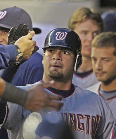 
The Nationals greet Jesus Flores after his two-run homer. Associated Press
 (Associated Press / The Spokesman-Review)