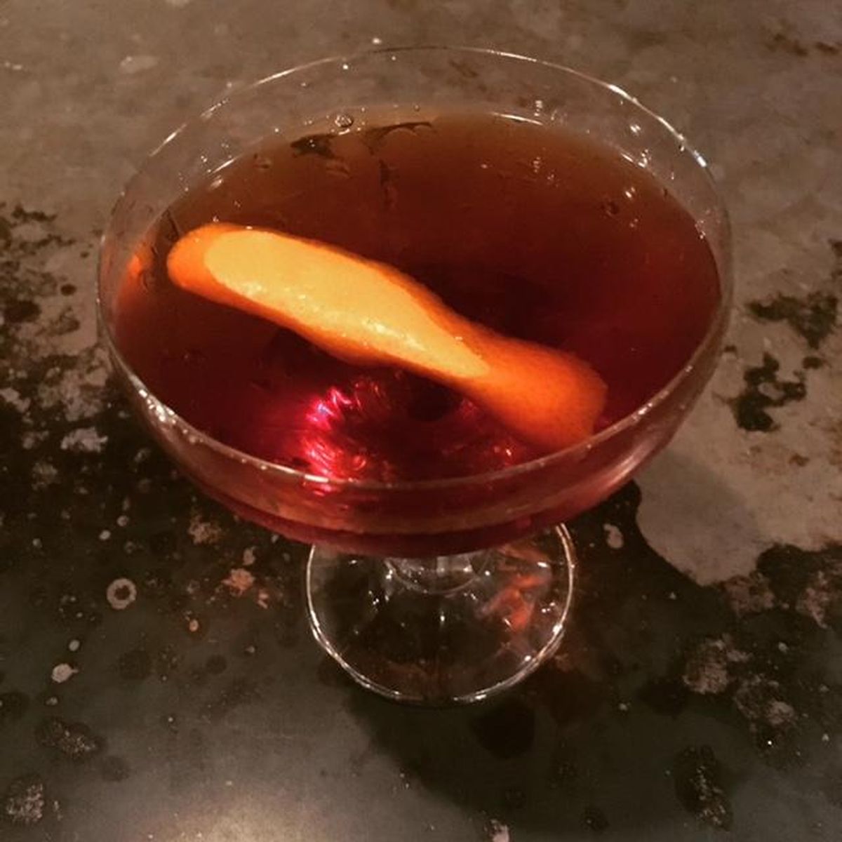 Avont Grant’s twist on the classic Manhattan features a tincture of dark rum infused with a cigar for smoky flavor and dry finish. (Adriana Janovich)