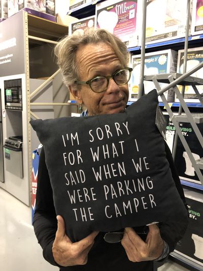 This pillow says it best: Parking can be a major pain point for couples traveling together. (Leslie Kelly)