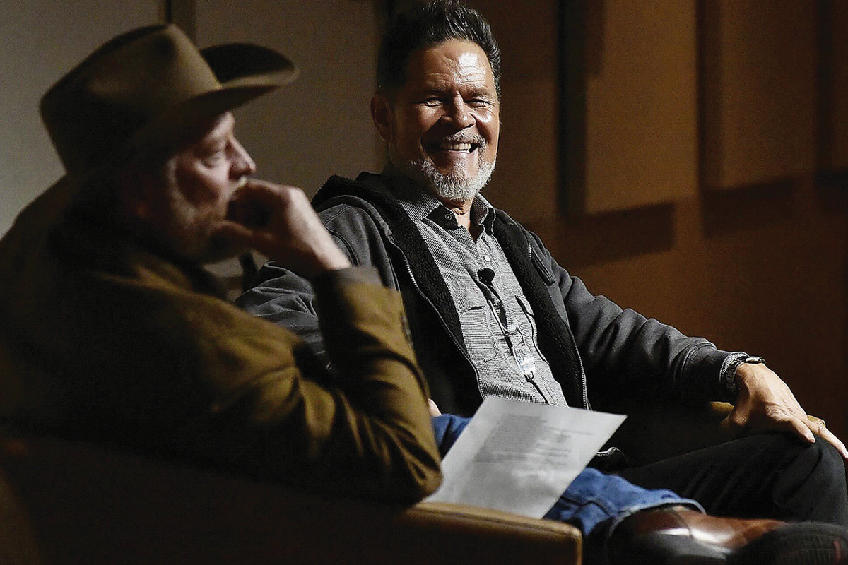 “Longmire” actor A Martinez, right, and author Craig Johnson talk during a recent Booth Western Museum event. The two will be on the Northwest Passages stage Tuesday evening in Spokane to discuss Johnson’s newest book “First Frost” in the Longmire series.  (Courtesy)