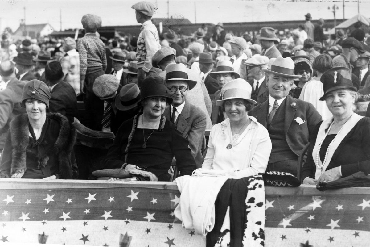 Spectators watch the air show going on behind the crowds, while the front poses for a photograph at the Sept. 19-25, 1927, National Air Show at Felts Field in Spokane. The Spokane Daily Chronicle reported 91,989 tickets were sold for the event.