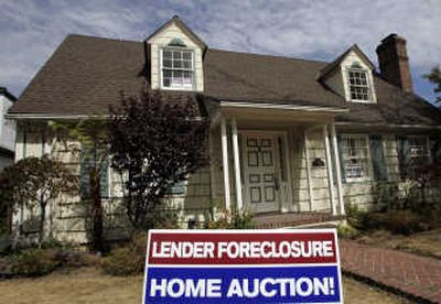 
A home is advertised for sale at a foreclosure auction in Pasadena, Calif., last month. Associated Press
 (Associated Press / The Spokesman-Review)