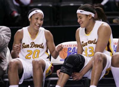 
Sybil Dosty, right, and LC grad Briann January led ASU past UW. Associated Press
 (Associated Press / The Spokesman-Review)
