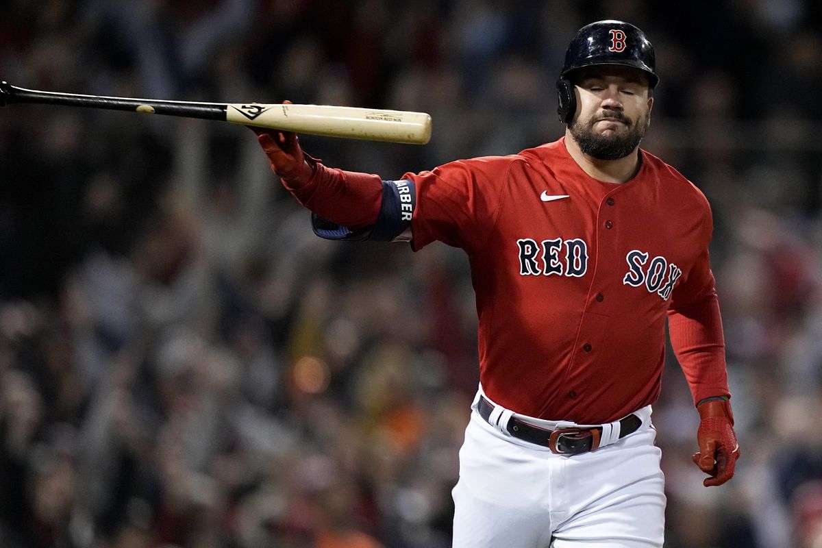 Boston Red Sox’s Kyle Schwarber tosses his bat after a grand slam home run against the Houston Astros during the second inning in Game 3 of baseball’s American League Championship Series Monday, Oct. 18, 2021, in Boston.  (David J. Phillip)