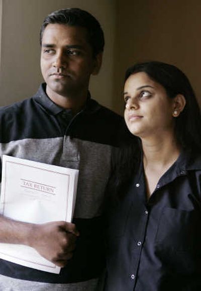 
Ranjeet Kumar and wife, Minanshu Jha,  of San Jose, Calif., won't get economic stimulus checks because of her immigration status. Associated Press
 (Associated Press / The Spokesman-Review)